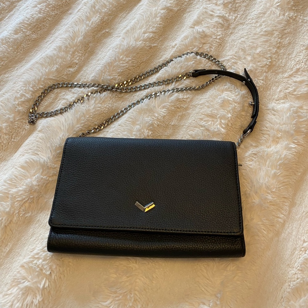 Botkier black leather chain wallet.